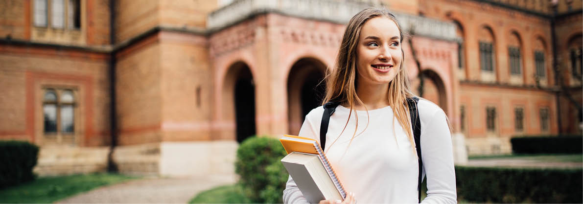A portrait of a mixed race college student at campus